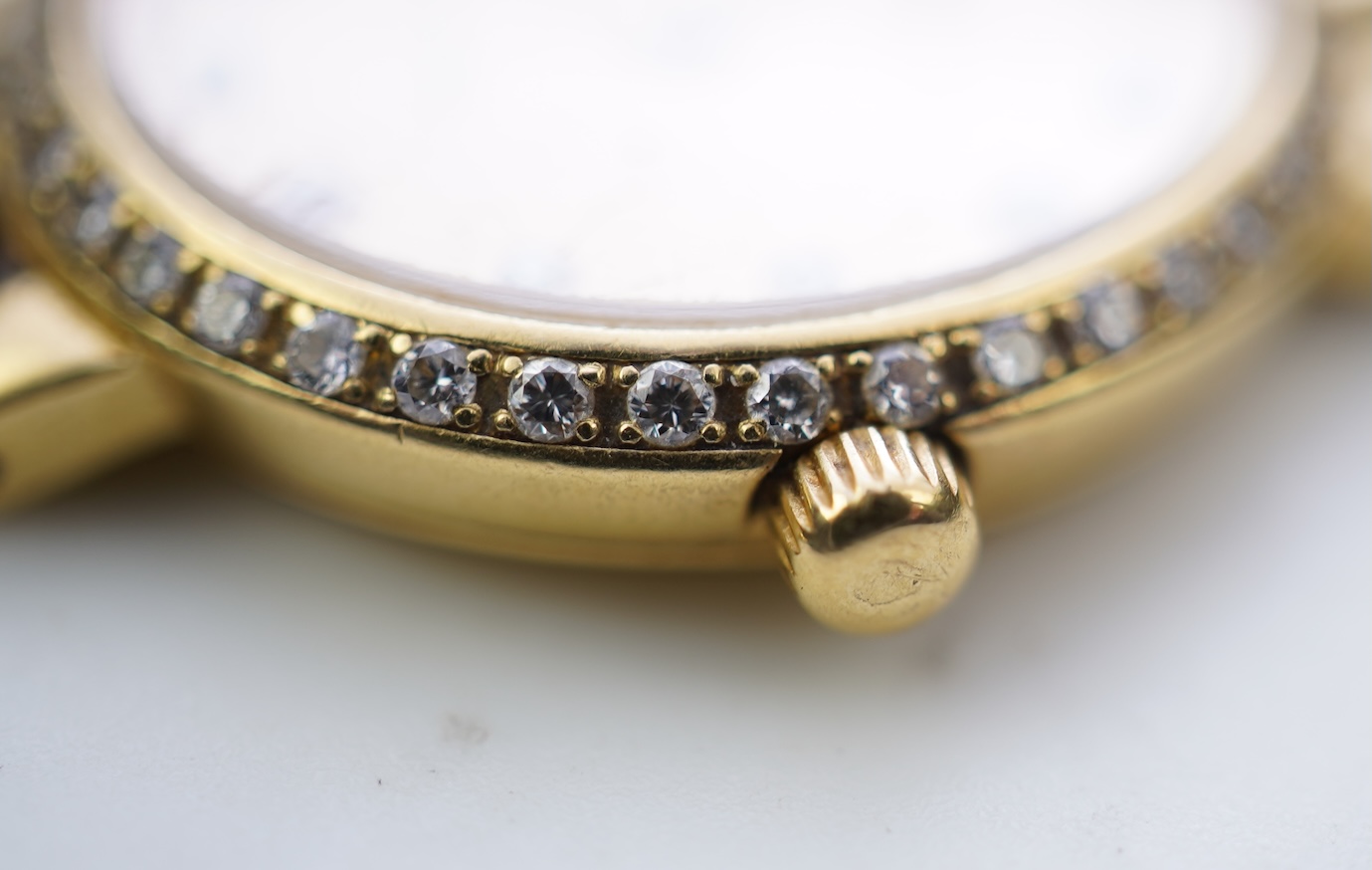 Omega, a lady's 18ct gold and diamond 'De Ville' wristwatch